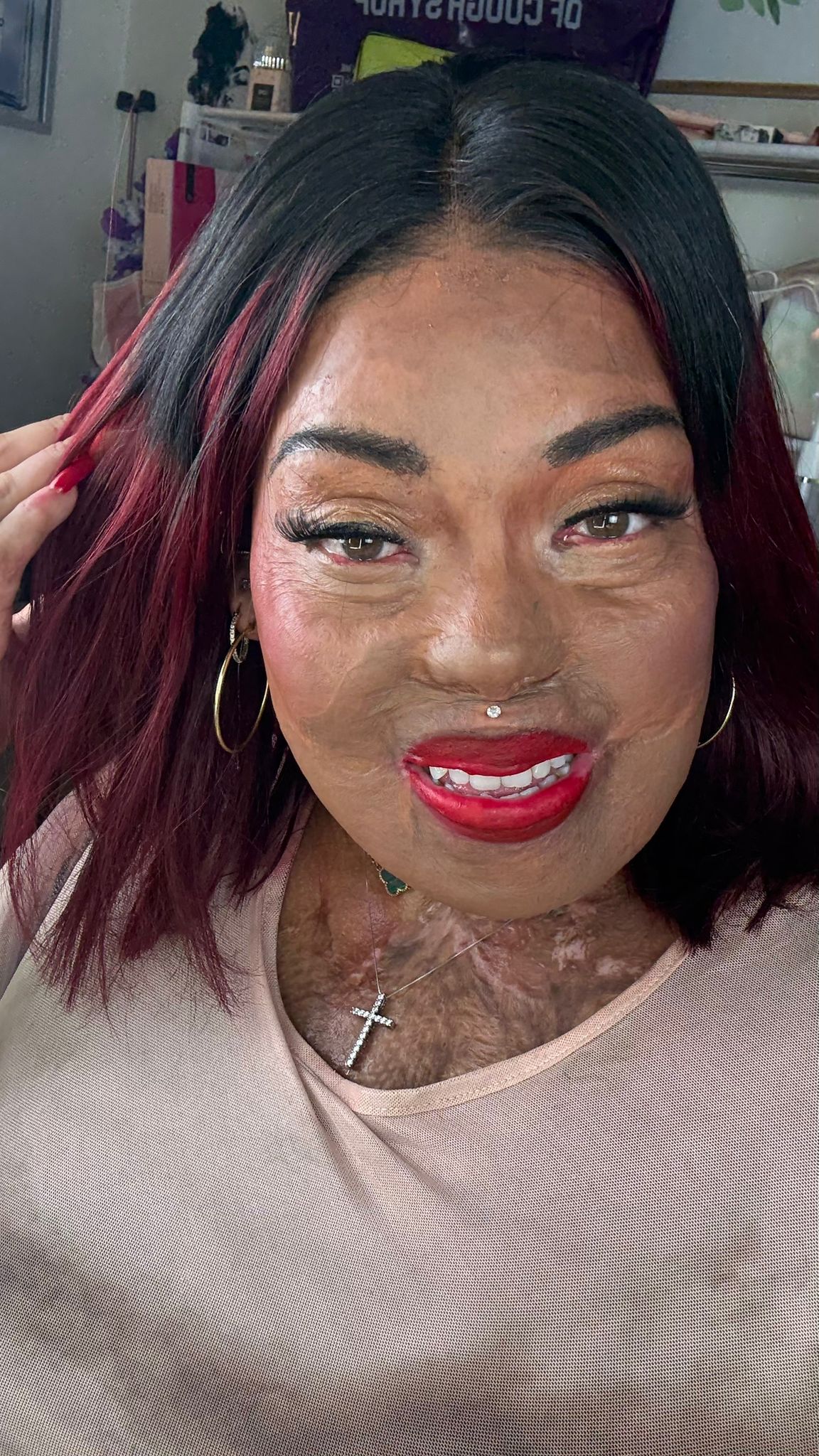 Mettalusso collabs with BurnedBeauty2018 on her signature deep red vegan creamy satin matte lipstick